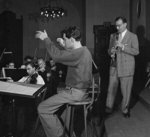 Leonard Bernstein, Benny Goodman, and Max Hollander, Carnegie Hall, New York, N.Y., between 1946 and 1948 by William P. Gottlieb / Library of Congress